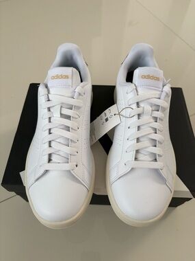 adidas White Sneakers with Gold Logo Accents